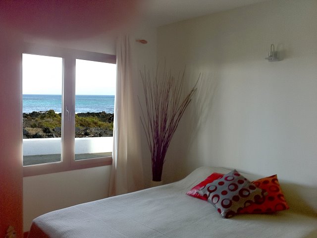 Bedroom with sea views